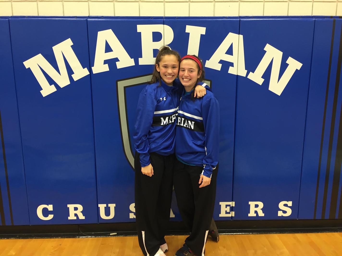 Cousins on and off the court: Marian ballers share athletic bond