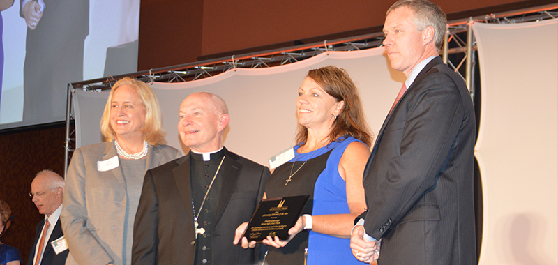 Secondary teacher of the year:  Genoways honored at Archdiocesan dinner