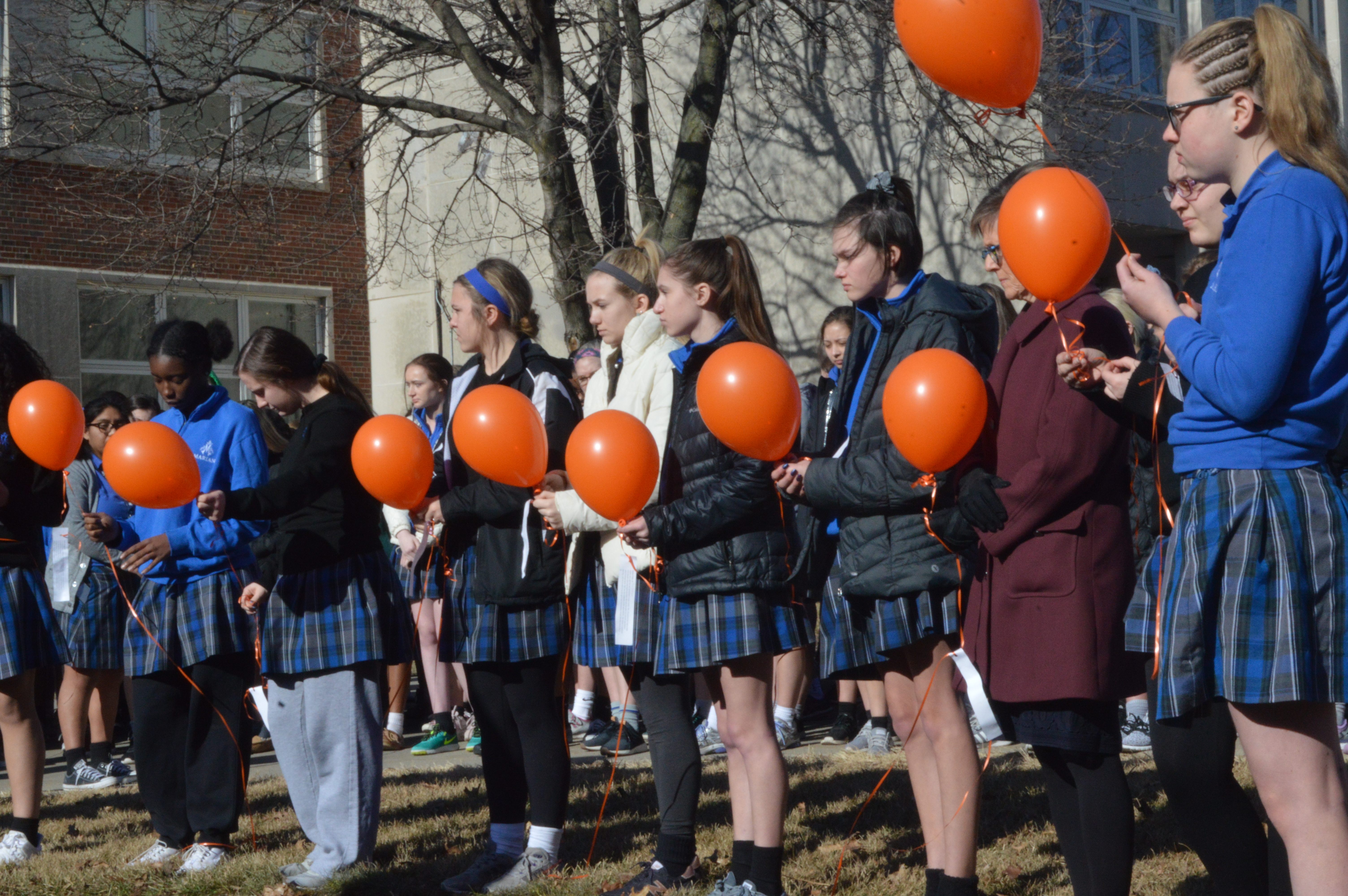 Students pray for victims, hope to end gun violence