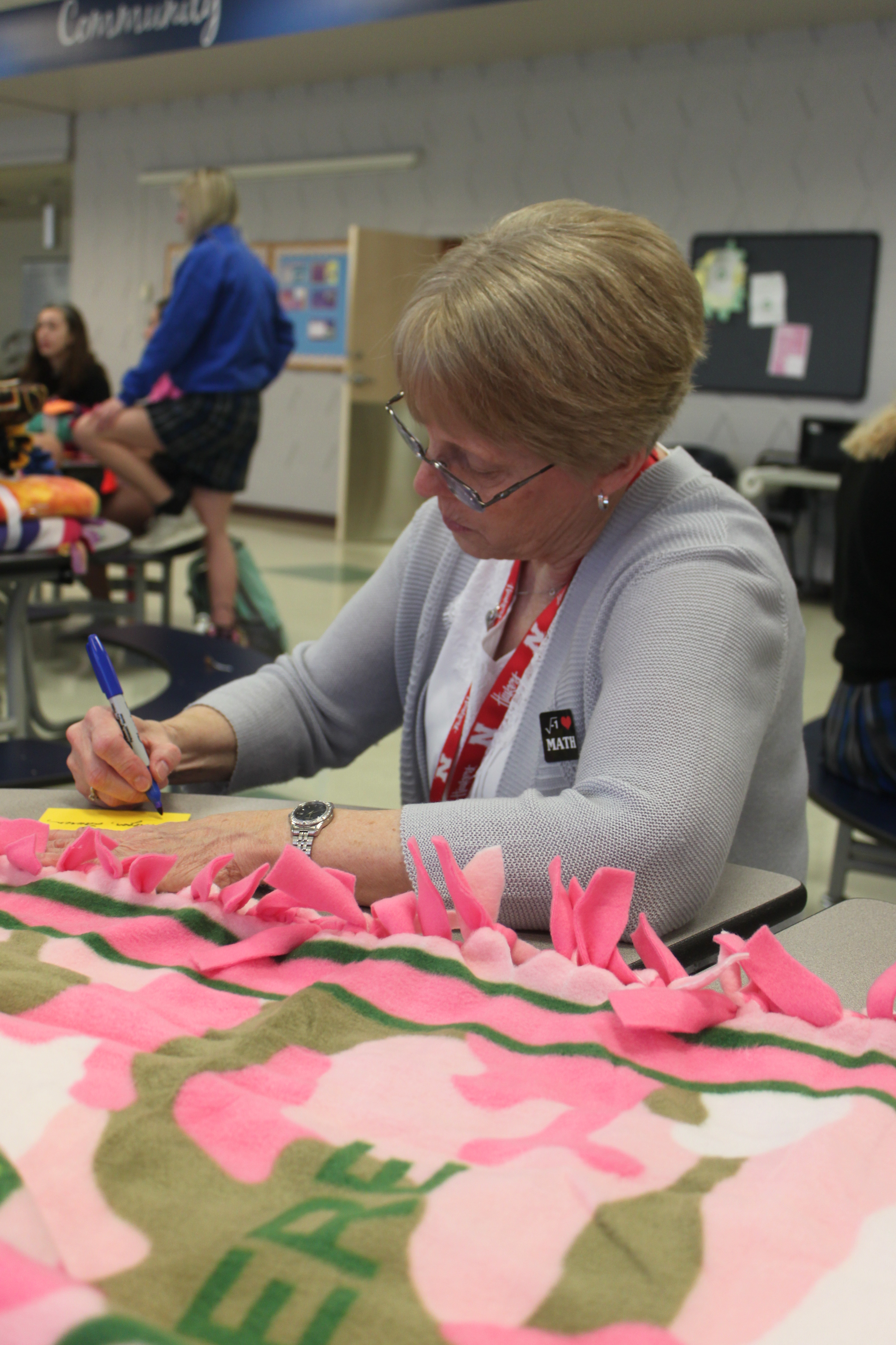 Students ‘pi and tie’ to help cancer patients on pi day