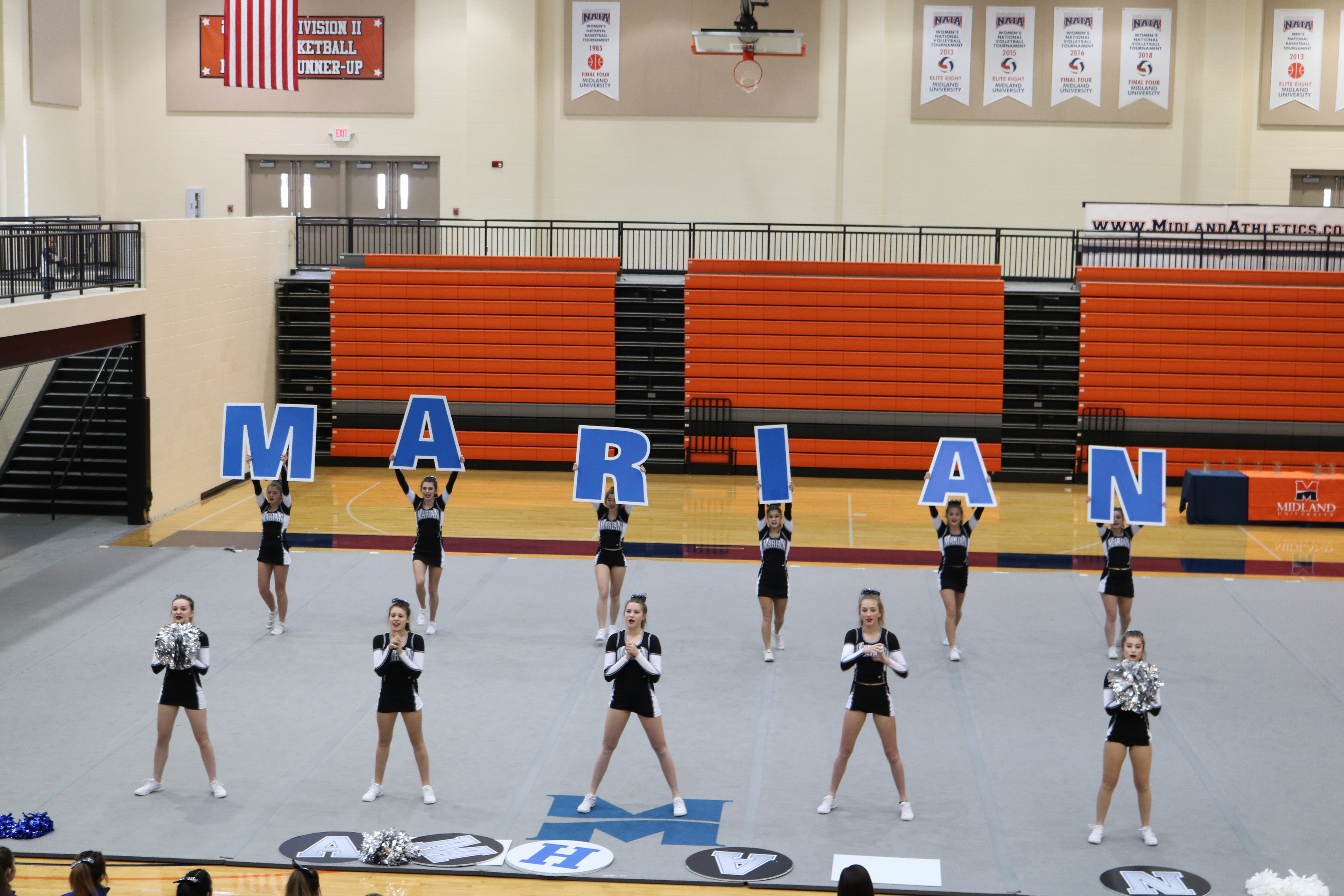 What even is a cheer competition? : The inside scoop on the ambiguous world of back flips and toe-touches