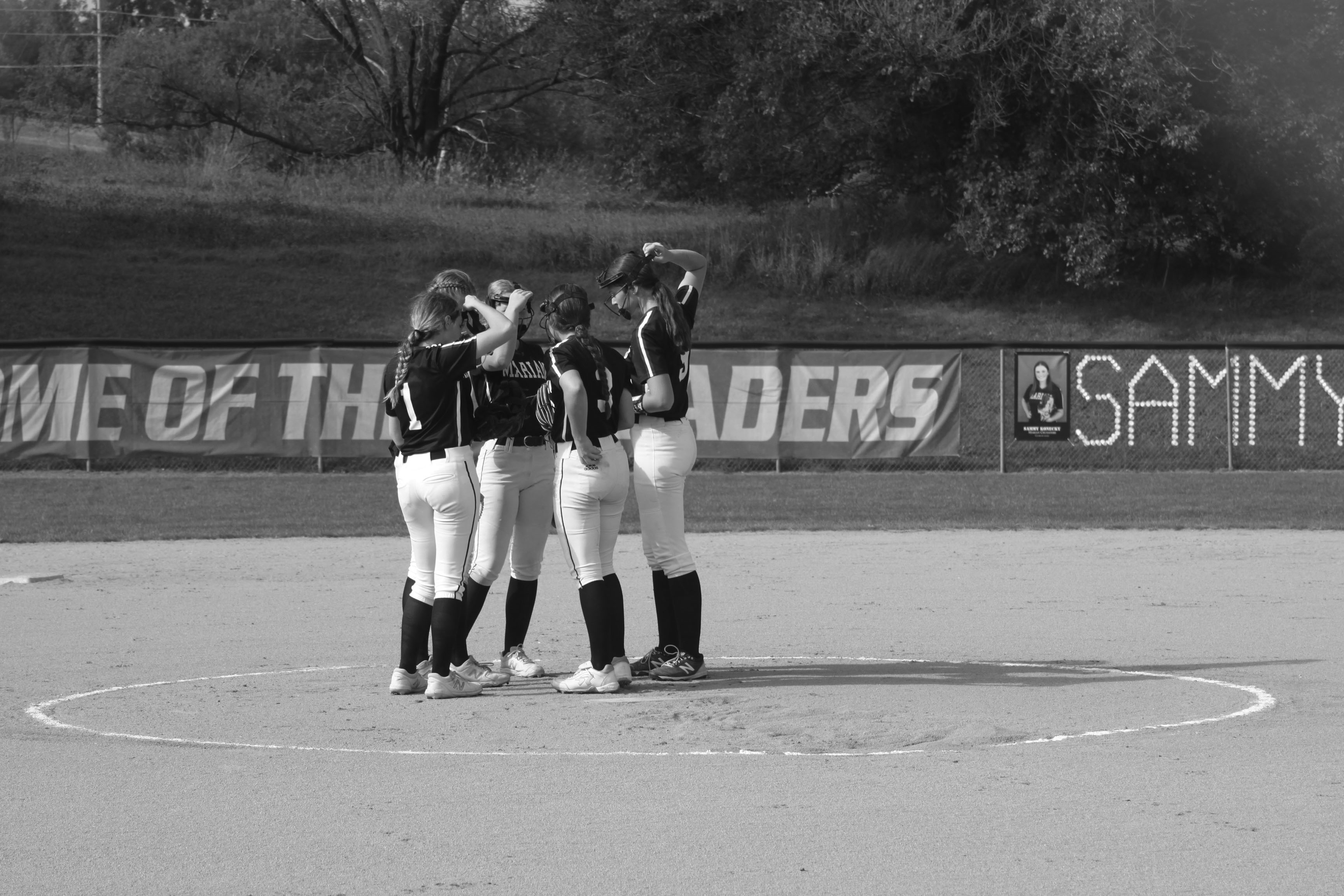 Softball concludes season with district games, hope for future