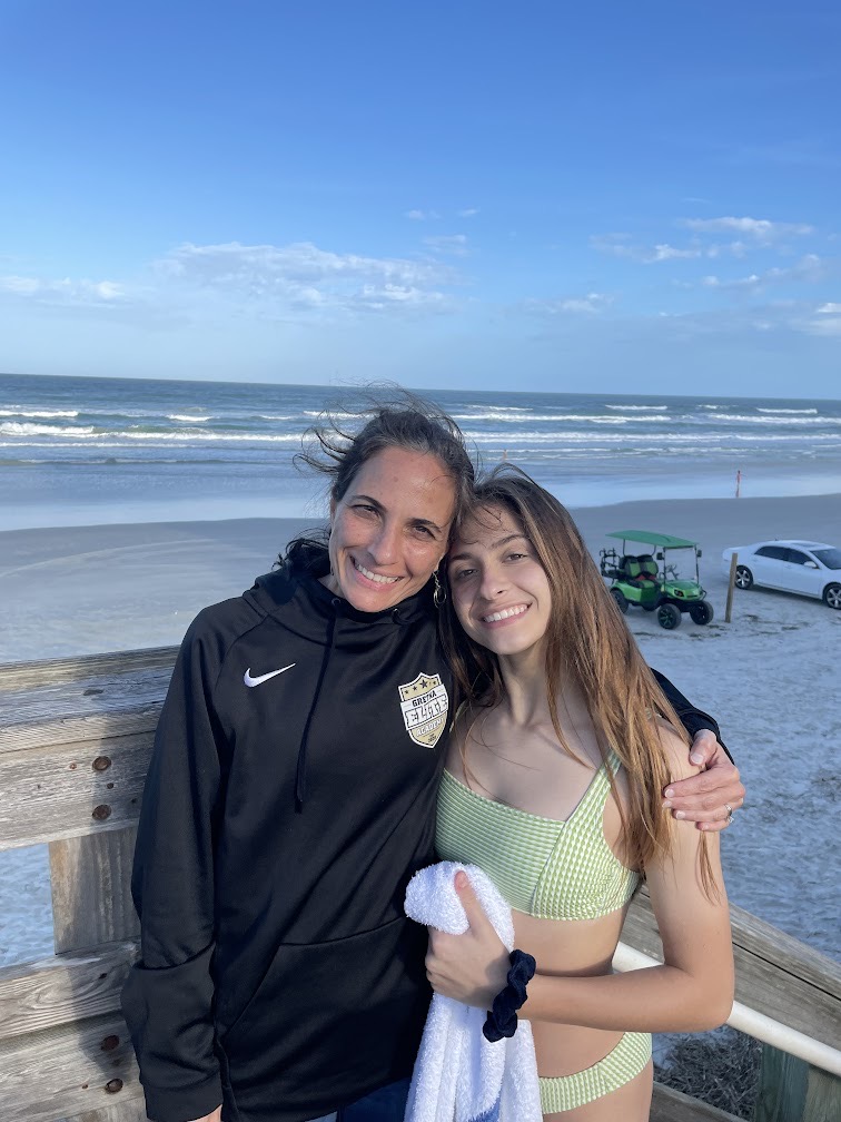 Mother is Both Coach and Cheerleader for Daughter