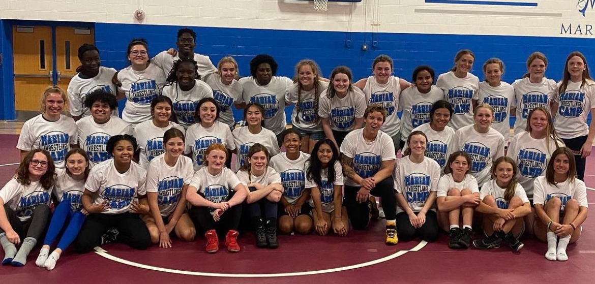 Marian wrestling camp finds balance between competition, community