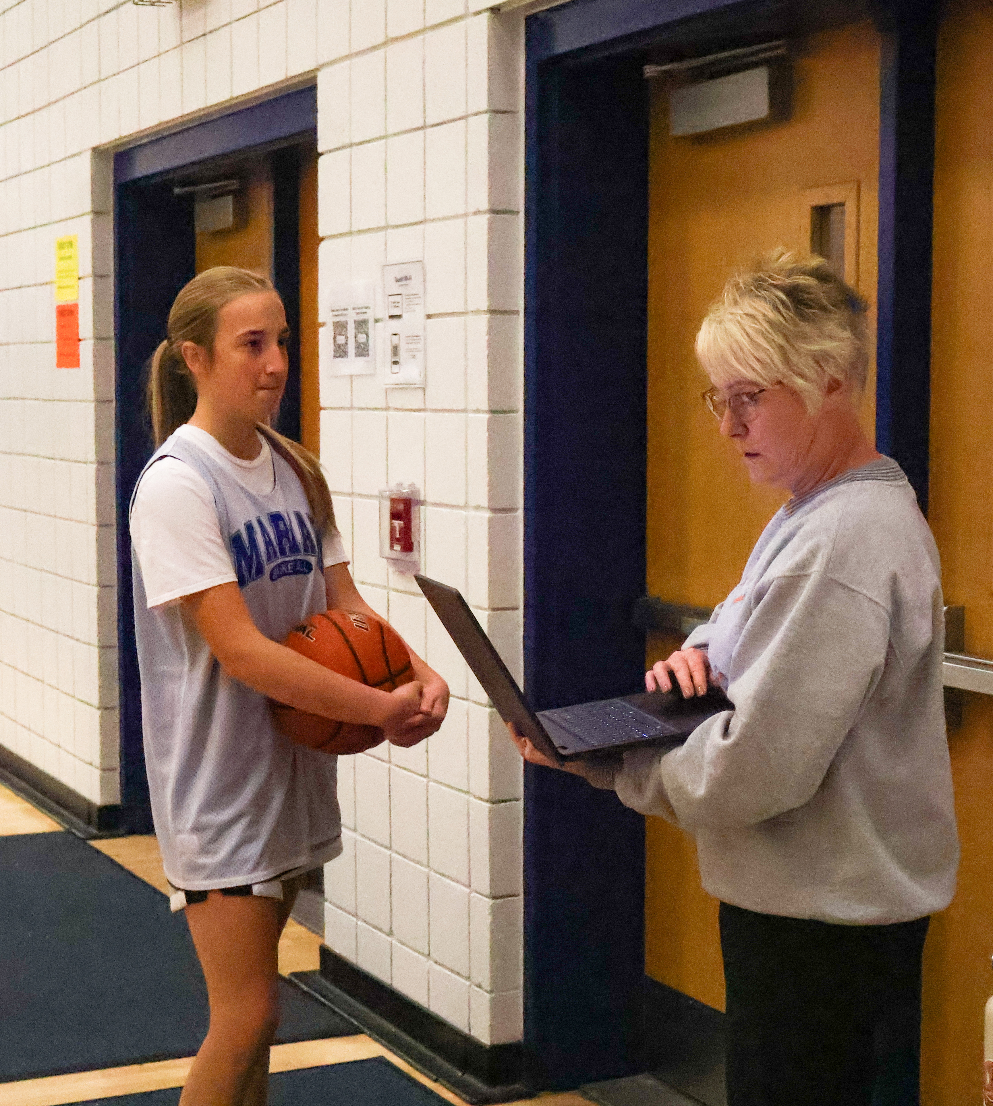 Athletic trainer scores from behind the scenes